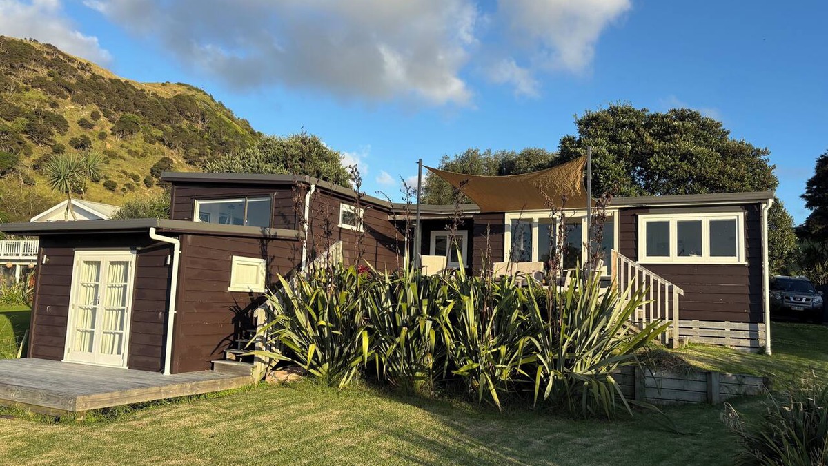 Port Waikato House | A restorative stay where the mighty Waikato awa meets the Tasman Sea