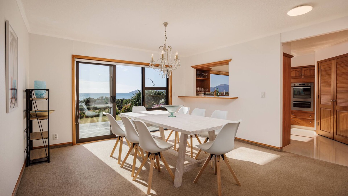 Raumati South House | Absolute Beach Front Luxury Holiday Home Swim Beach Spectacular Sunsets