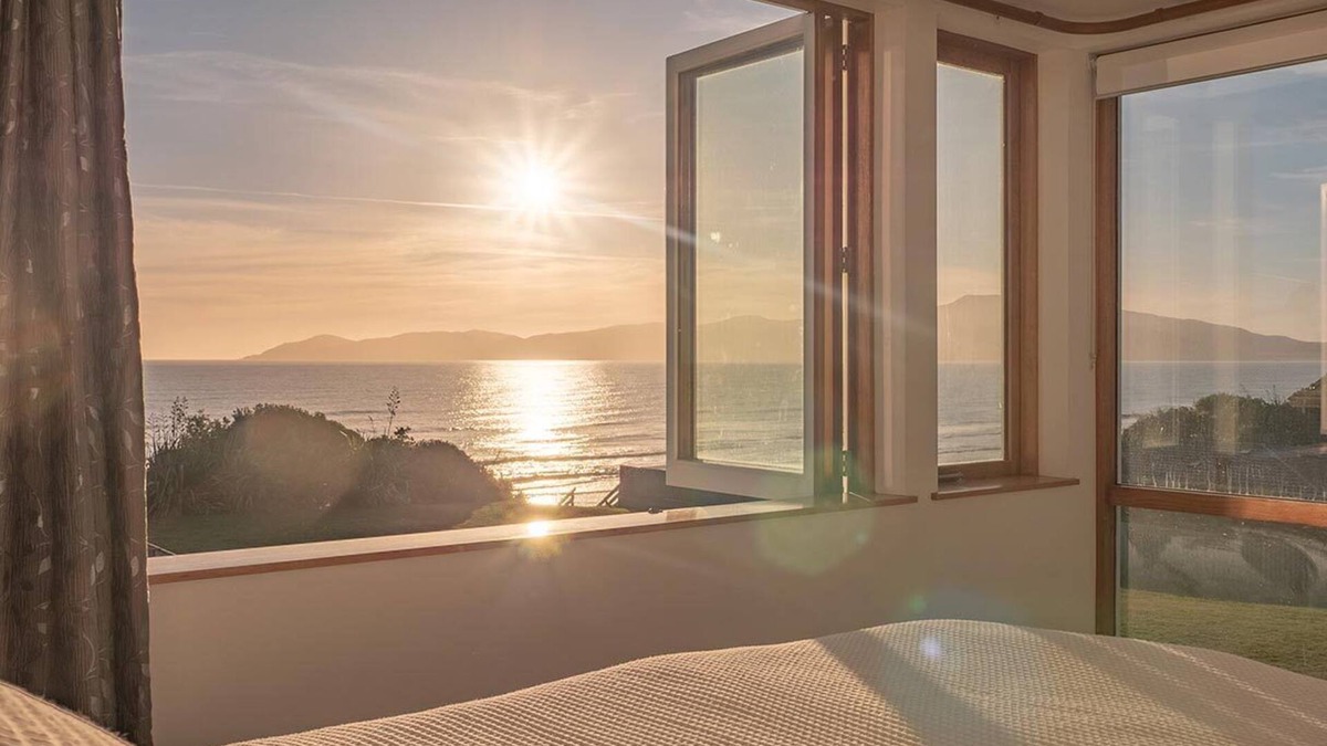 Raumati South House | Absolute beachfront home with stunning views in Raumati. Sleeps up to 18 people.