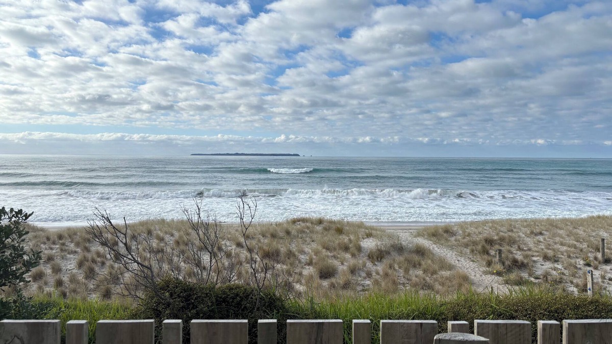 Papamoa Beach House | Beachfront: 30 seconds to the sand from our laid back, quintessential Kiwi bach.