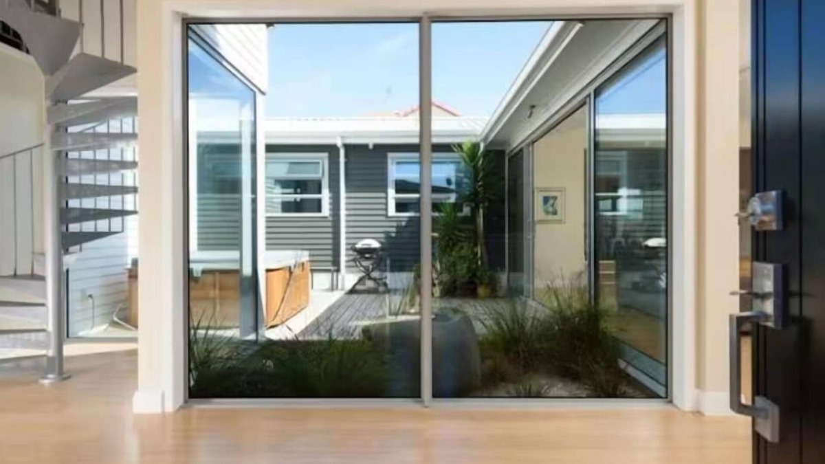 Papamoa Beach House | Luxurious modern Beach Getaway with spa pool. Only 150m to white sandy beach
