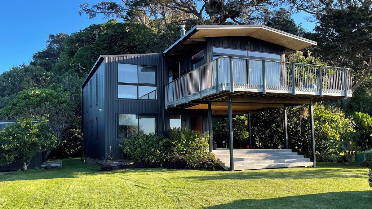 Matapouri House | Peaceful 4-Bedroom Beach House across road from estuary & fantastic beach views