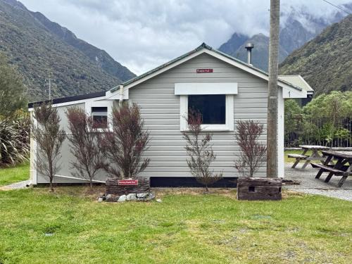 Otira House | Rustic Alpine Hut Simple Mountain Comfort by Road and Rail