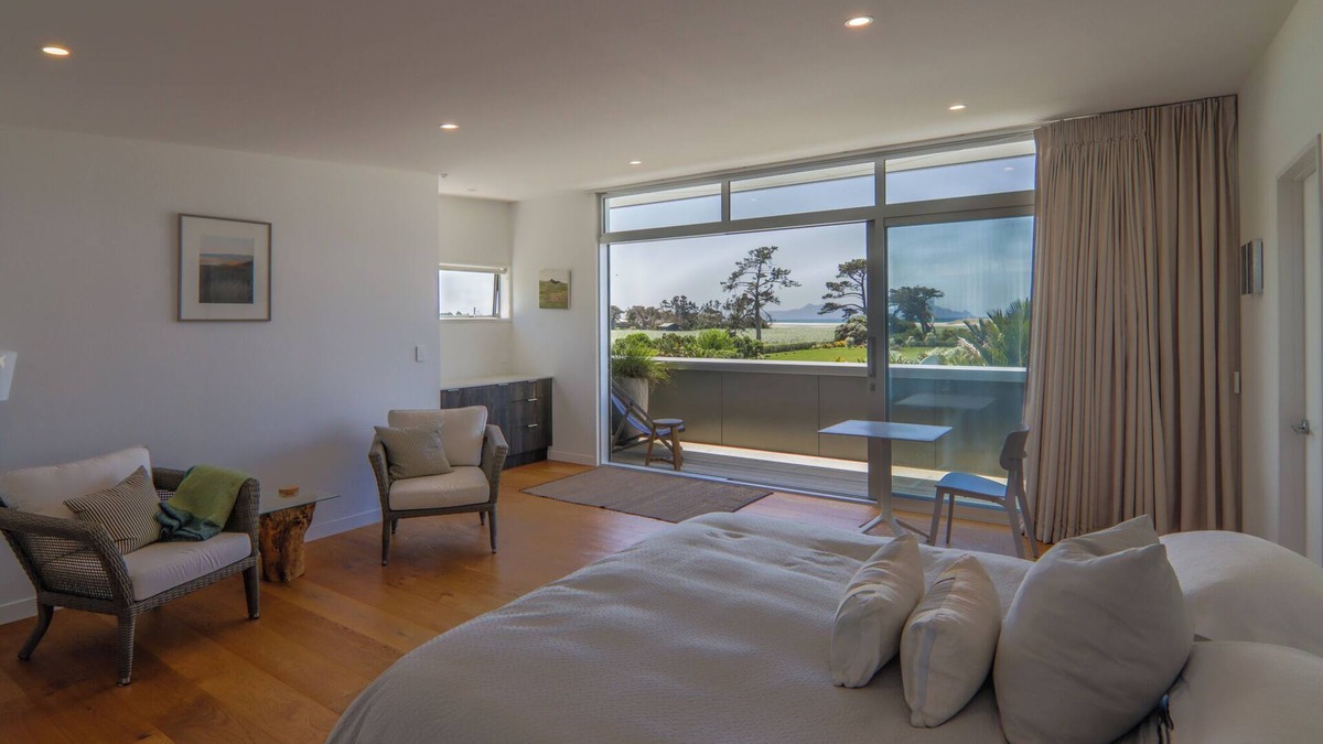 Waipu Apartment | Sea and rural views from your private deck, surrounded by tropical gardens