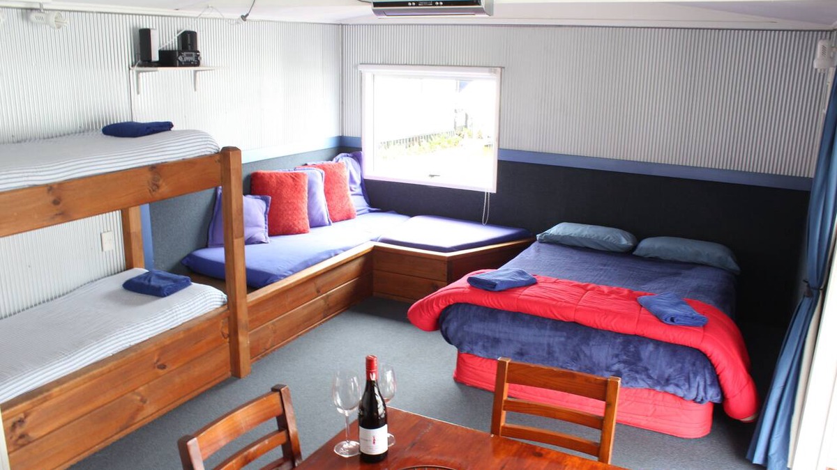 Okere Falls RV Rental | Self-Contained Cabin in a Prime Waterfront Location on Lake Rotoiti