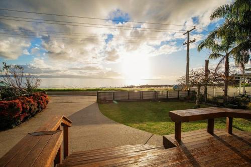 Ngarimu Bay House | Sunsets by the Beach Waterfront Sleeps 8