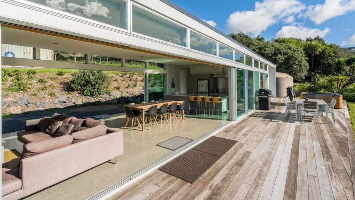 Mangawhai House | The Glass House - Modern, pet-friendly designer holiday home with spectacular views and spa pool