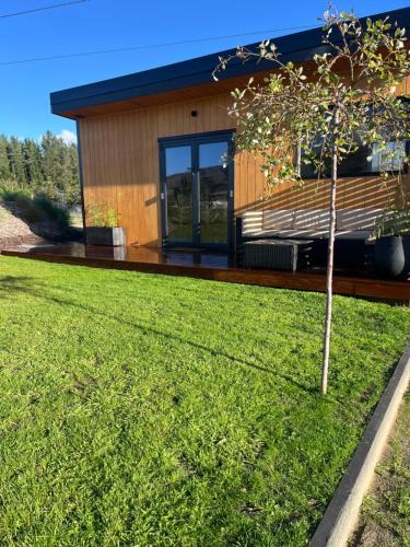 Lowburn House | Tiny home with mountain and orchard views
