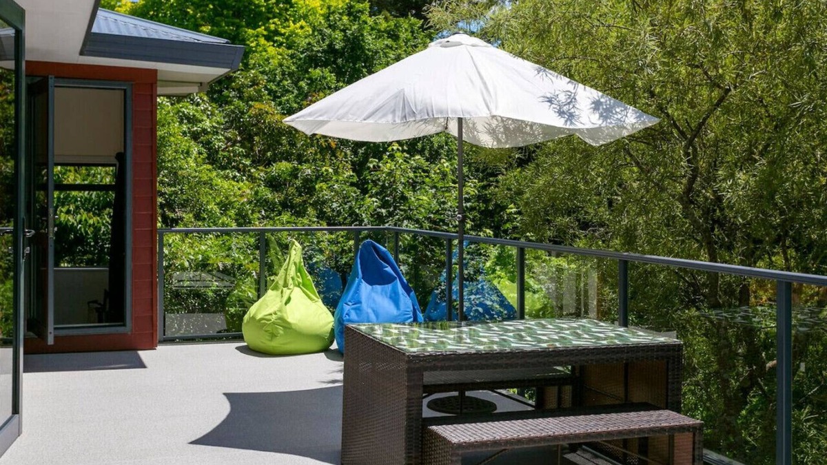 Waipahihi House | Treetop Living - peaceful oasis, serene and cozy interior, scenic views of native bush.