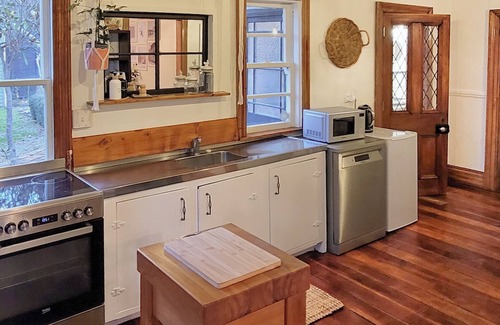 Solway House | A charming 4-bedroom home! Just steps away from cozy cafes and local shops.