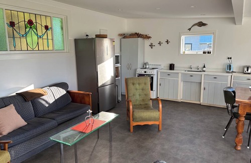 Port Waikato House | A restorative stay where the mighty Waikato awa meets the Tasman Sea