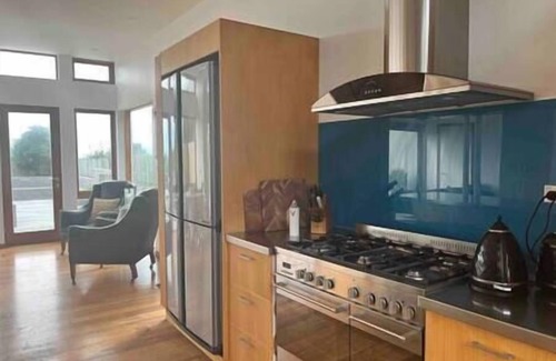 Raumati South House | Absolute beachfront home with stunning views in Raumati. Sleeps up to 18 people.
