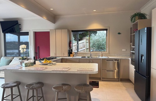 Opua Cottage | Absolute Waterfront Island Time Cottage with Sea Views in the Winterless North