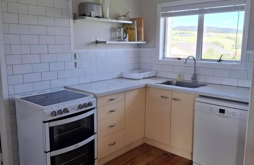 Ruakaka House | Beautiful Ruakaka beach fun, lots of space, 2 lounges, big garden