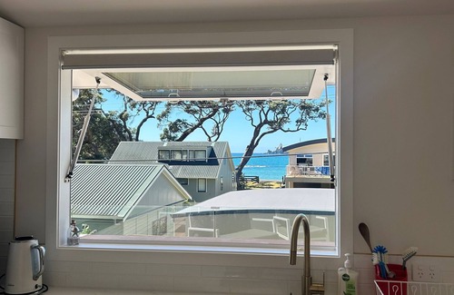 Oakura House | Beautifully renovated 5-bedroom bach just steps from the sand.