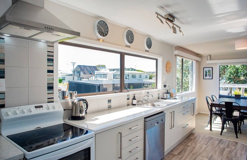 Waihi Beach House | Brighton family bach - sea views, close to beach, park & shops, pet friendly!