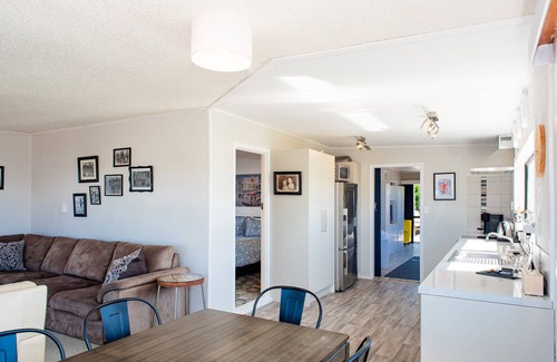 Waihi Beach House | Brighton family bach - sea views, close to beach, park & shops, pet friendly!