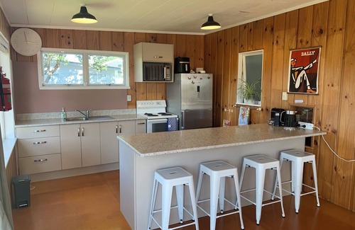 Waipu Cove House | Classic Waipu Cove Kiwi bach perfect for family beach stays