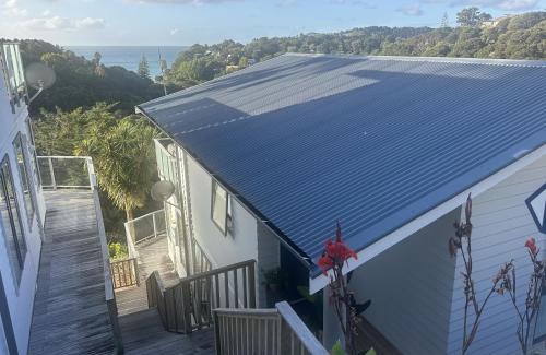 Palm Beach House | Deluxe Bedroom in SHARED 95m Premium Apartment at Waiheke Island Resort