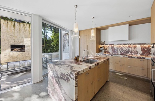 Ponsonby House | Experience luxury living in the heart of Ponsonby at this stunning four-bedroom retreat. Featuring a heated spa, swimming pool, sauna, beautiful gardens, outdoor fire, and expansive indoor-outdoor living, The Ponsonby Sanctuary is the perfect escape
