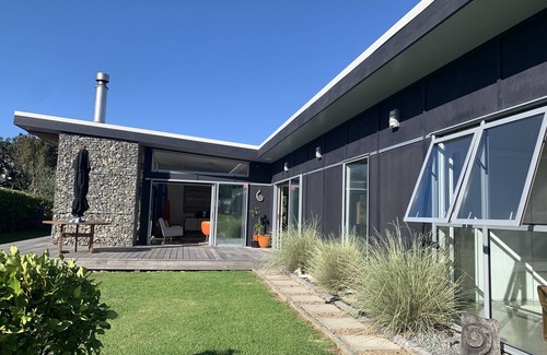 Whiritoa House | Family Friendly Modern Bach with Decks & Outdoor Fire, 200m from Beach/Surf Club