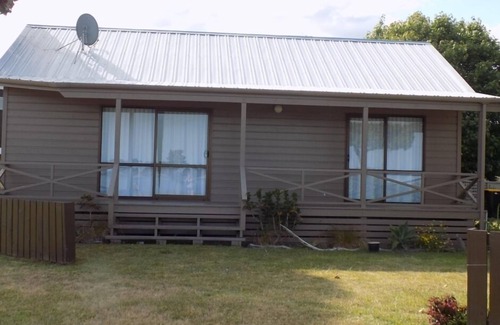 Tairua House | Harbour Views 30 metres from the sea and sand beach.
