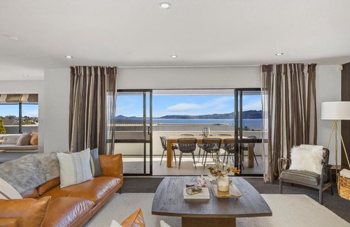 Waipahihi House | Harvey Heights Retreat - with lake views, spa, and space for parking boat
