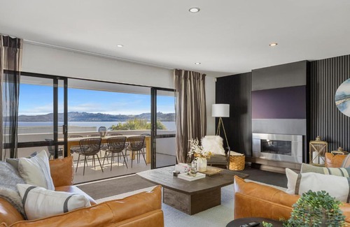 Waipahihi House | Harvey Heights Retreat - with lake views, spa, and space for parking boat