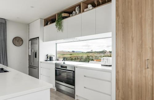 Raglan House | Hillside Haven, Design-led Beach Escape