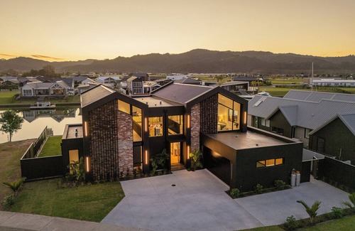 Whitianga House | Luxury Canal Front Home in Whitianga with Private Pontoon for Mooring Boat