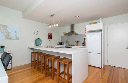 Mangawhai Heads House | Ocean Views - Modern, sunny, pet friendly holiday home only a short walk from the estuary