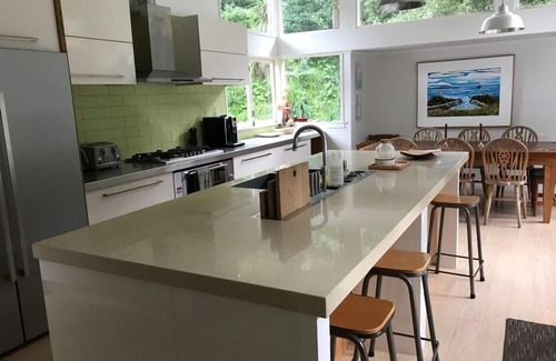 Leigh House | Relax at this Matheson Bay retreat.