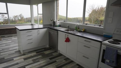 Whiritoa House | Sea & Mountain Views Retreat on Rosemary Farm