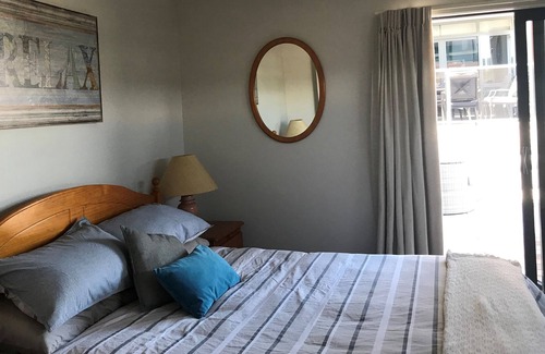 Whangamata Apartment | Spectacular Apartment with Spa pool, Heated Swimming pool, Private Decks & some
