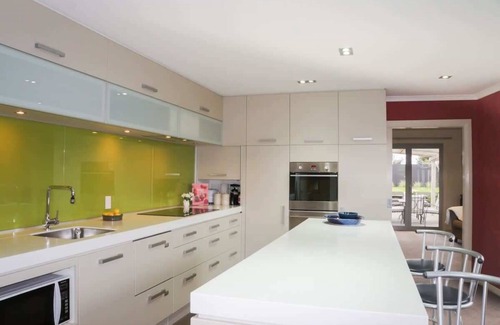 Fitzroy House | Stylish Holiday Home with Sunlit Patios