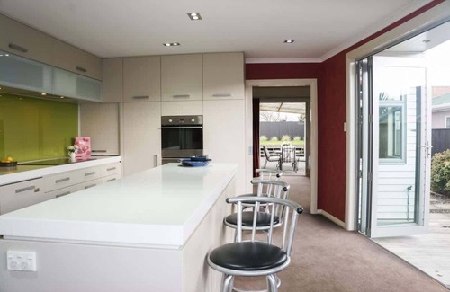 Fitzroy House | Stylish Holiday Home with Sunlit Patios