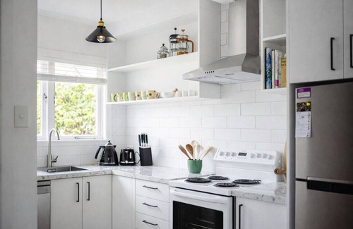 Devonport House | Stylish Howick Home with Sunny Covered Deck | Marigold by Homello