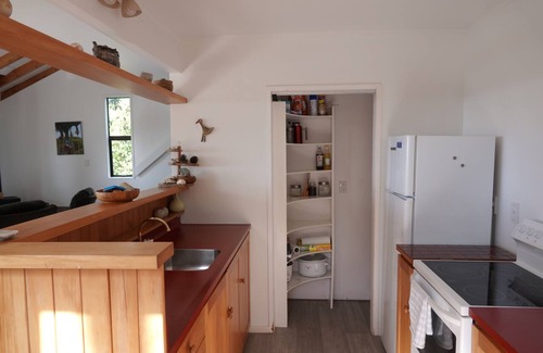 Tairua Cottage | Tairua Tree House - a traditional bach overlooking the Tairua Harbour