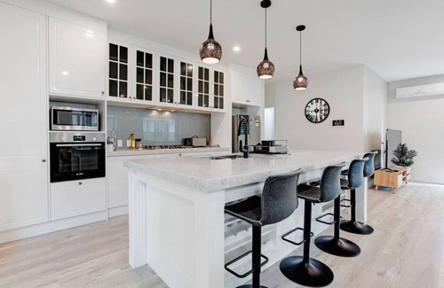 Hobsonville House | The Modern Avenue Home with Air-Con and Parking