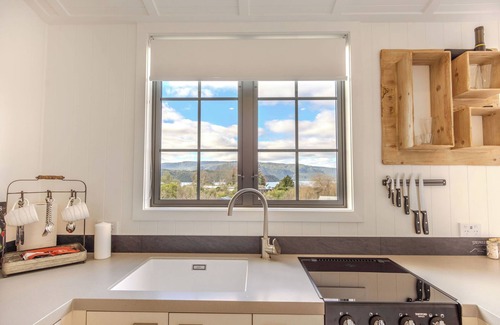 Lake Tarawera Cabin | The Shepherds Legacy hut with lake and mountain views/pet friendly
