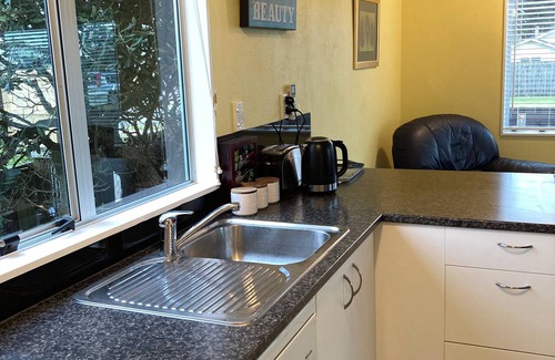 Waitarere Beach House | Waitarere Beach Bach. Pet friendly.