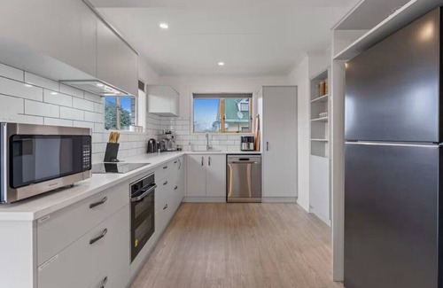 Two Mile Bay House | Walk to lake, and Sail Club with dual living