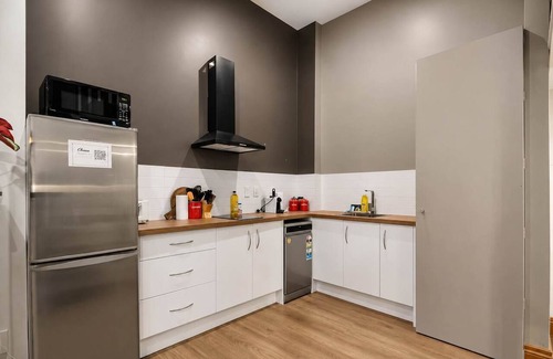 Wellington Apartment | Wellington City Loft | Parking + Kitchen
