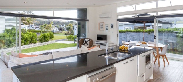 2 minutes toes hit sand! Superb beach house with amazing amenities WIFI!