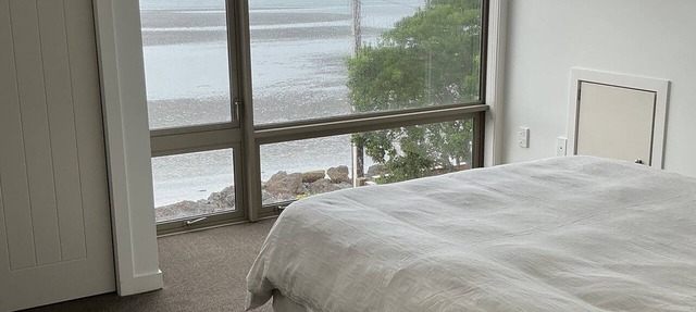 Absolute beachfront in Waiwera
