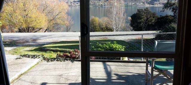 Absolute Lakefront quirky sixties Unit, spectacular lake and mountain views.