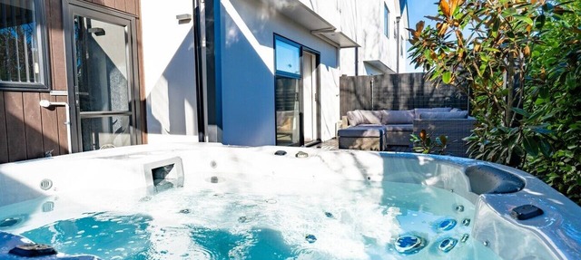 Addington 3BR Home with Private Spa, Garage and Courtyard