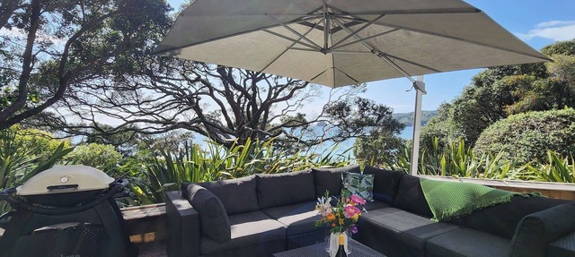 Beachfront Bliss, relax in the hammock and listen to the waves on your door step