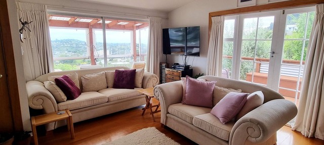 Character & Comfort in Art-filled home with Views