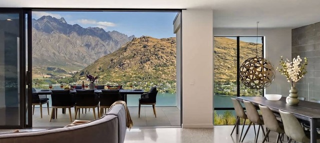 Elevated Elegance is a luxury retreat with dramatic views of the lake & mountains.